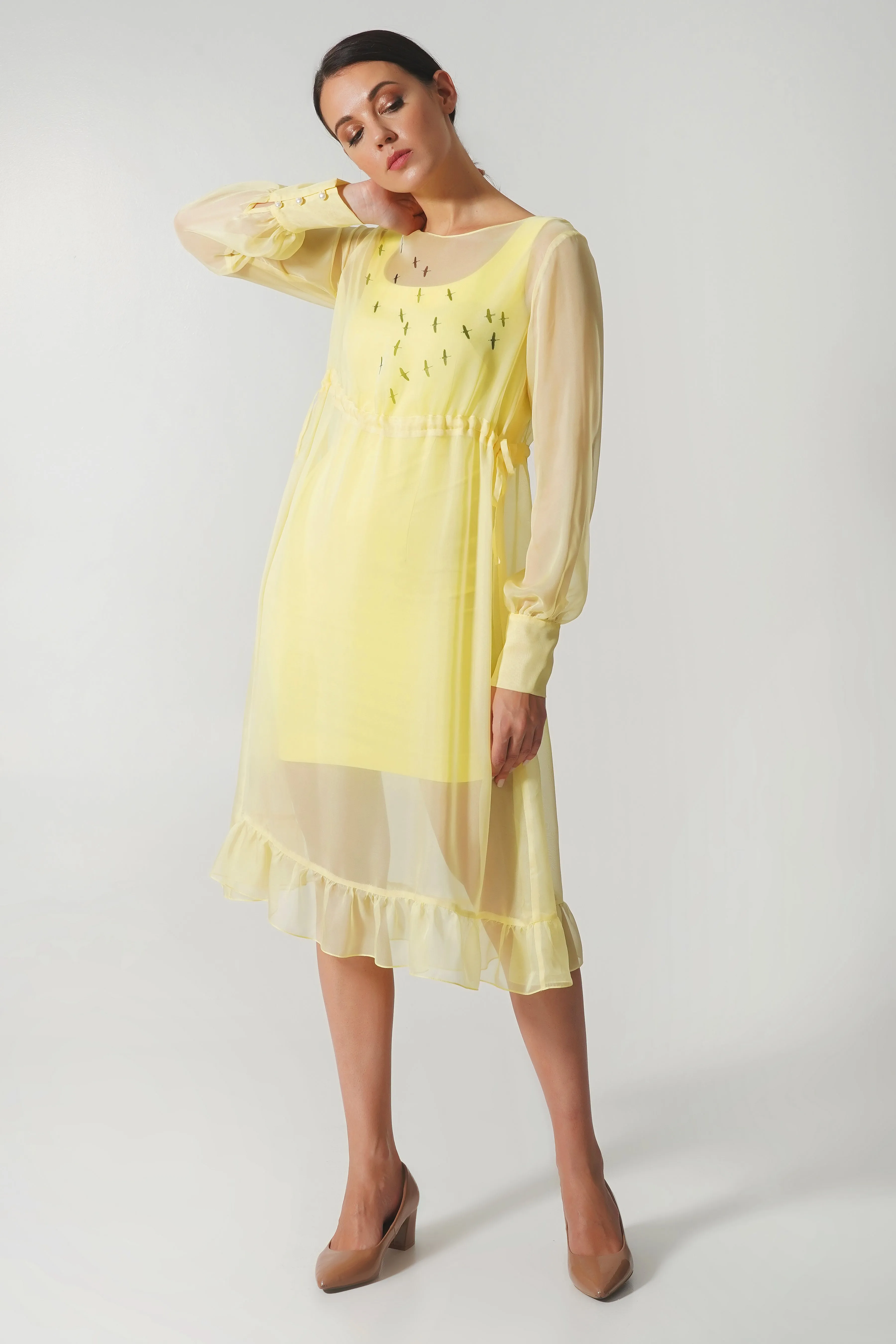 Yellow pencil dress with the see through overlay